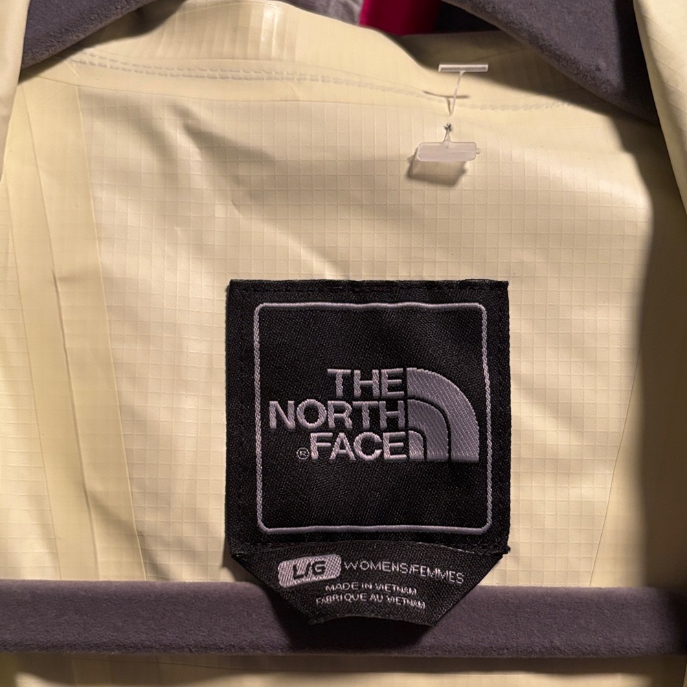 M16.  The North Face Women's Cream and Gray Jacket